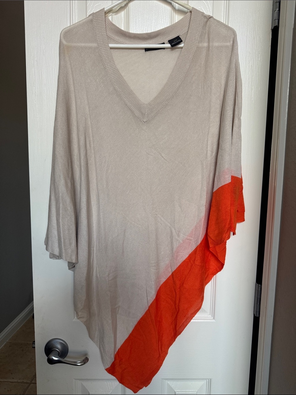 Light Beige V-Neck Poncho with Bright Orange Diagonal Hem